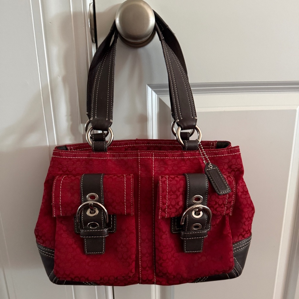 Coach red and brown purse.